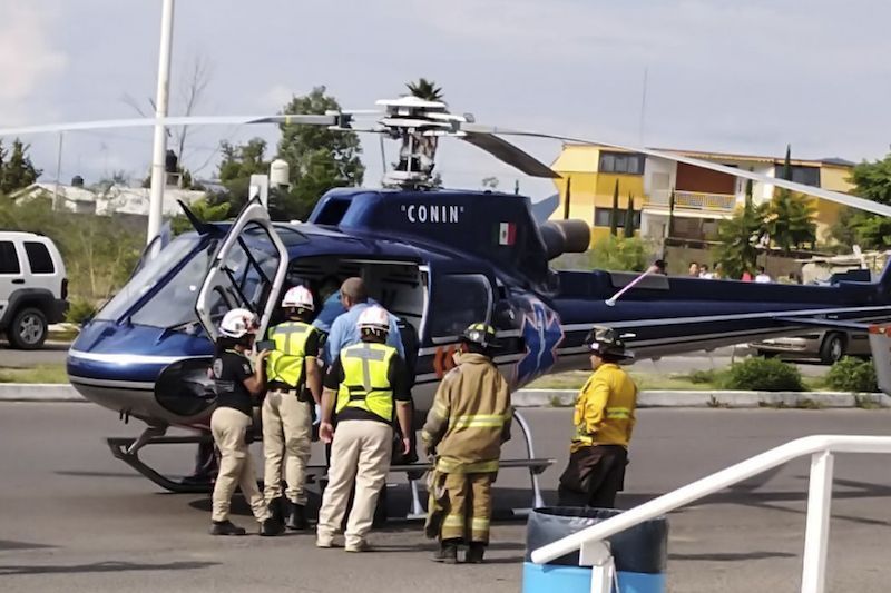 Muere esposa de policía en toma clandestina, su hija grave 1